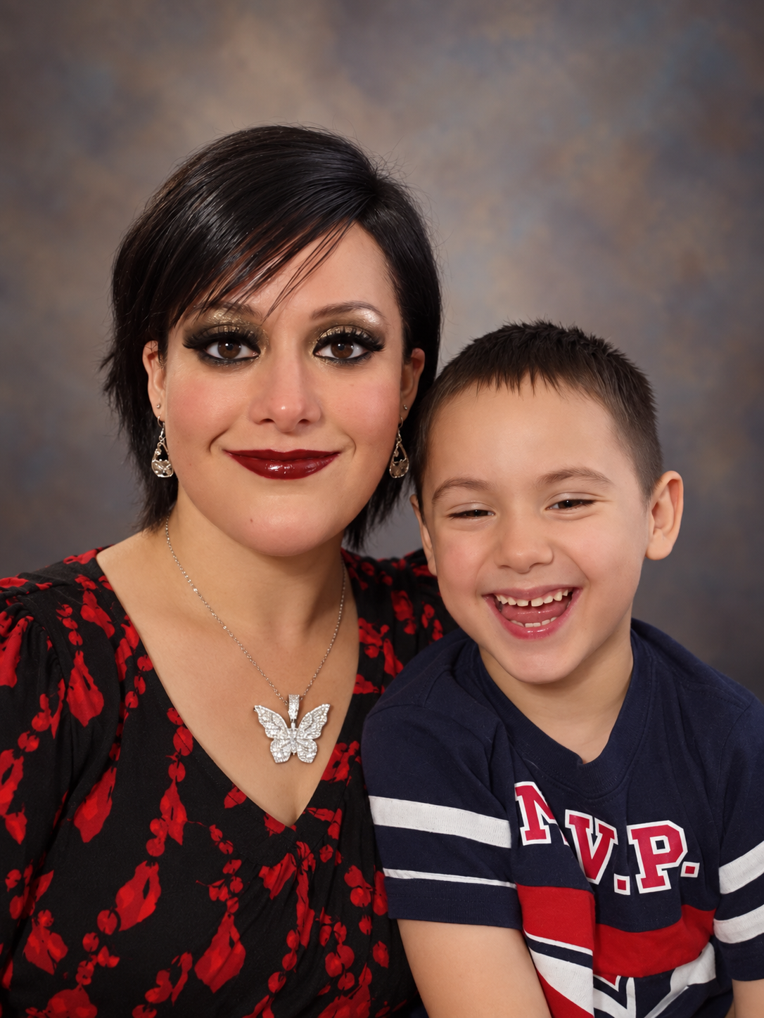 Christina Haney smiling with her son